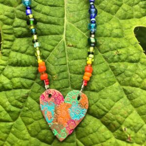 Beaded necklace with heart pendant