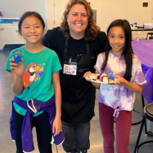 Art instructor with students